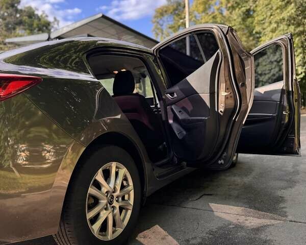 Коричневый Мазда 3, объемом двигателя 2 л и пробегом 190 тыс. км за 11200 $, фото 2 на Automoto.ua