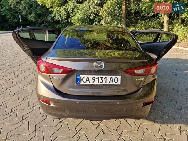 Коричневый Мазда 3, объемом двигателя 1.5 л и пробегом 77 тыс. км за 13900 $, фото 15 на Automoto.ua