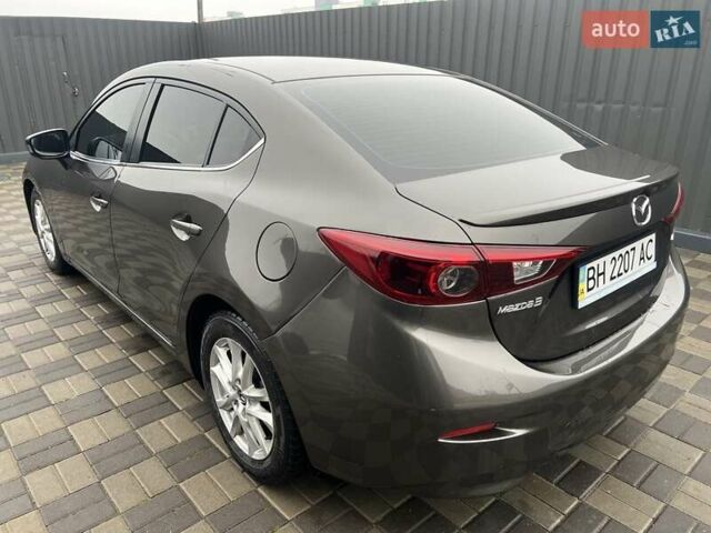 Коричневий Мазда 3, об'ємом двигуна 1.5 л та пробігом 94 тис. км за 12990 $, фото 17 на Automoto.ua