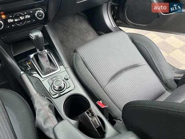 Коричневий Мазда 3, об'ємом двигуна 1.5 л та пробігом 94 тис. км за 12990 $, фото 49 на Automoto.ua