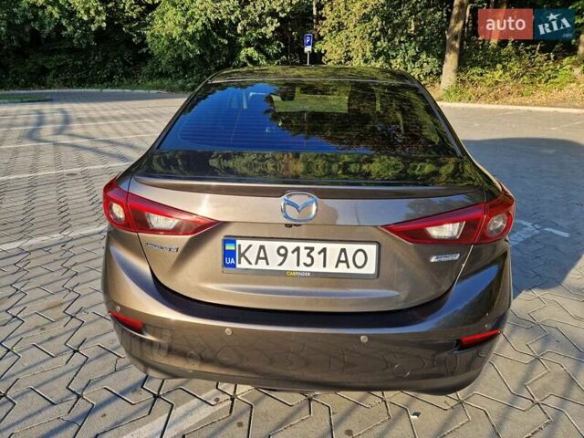 Коричневый Мазда 3, объемом двигателя 1.5 л и пробегом 77 тыс. км за 13900 $, фото 9 на Automoto.ua