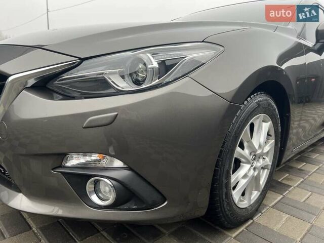 Коричневий Мазда 3, об'ємом двигуна 1.5 л та пробігом 94 тис. км за 12990 $, фото 3 на Automoto.ua