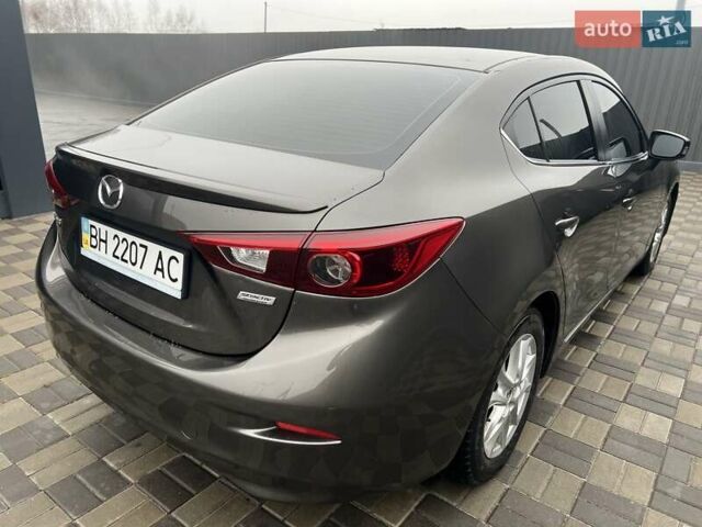 Коричневий Мазда 3, об'ємом двигуна 1.5 л та пробігом 94 тис. км за 12990 $, фото 22 на Automoto.ua