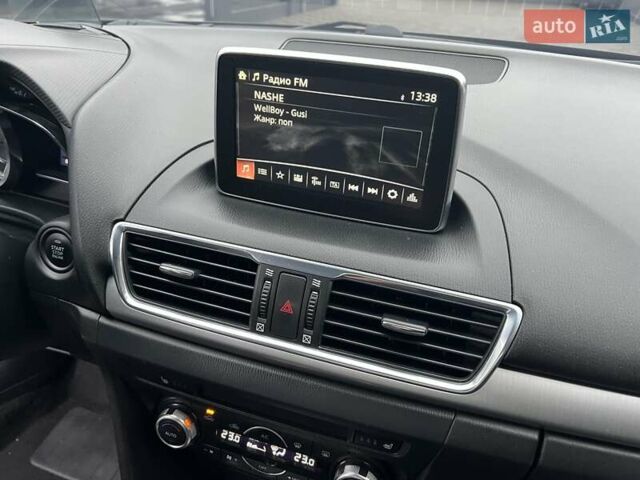 Коричневий Мазда 3, об'ємом двигуна 1.5 л та пробігом 94 тис. км за 12990 $, фото 32 на Automoto.ua