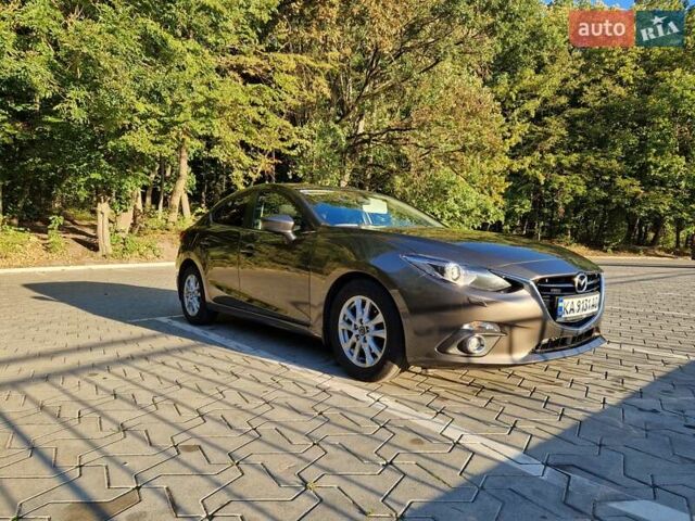 Коричневый Мазда 3, объемом двигателя 1.5 л и пробегом 77 тыс. км за 13900 $, фото 7 на Automoto.ua