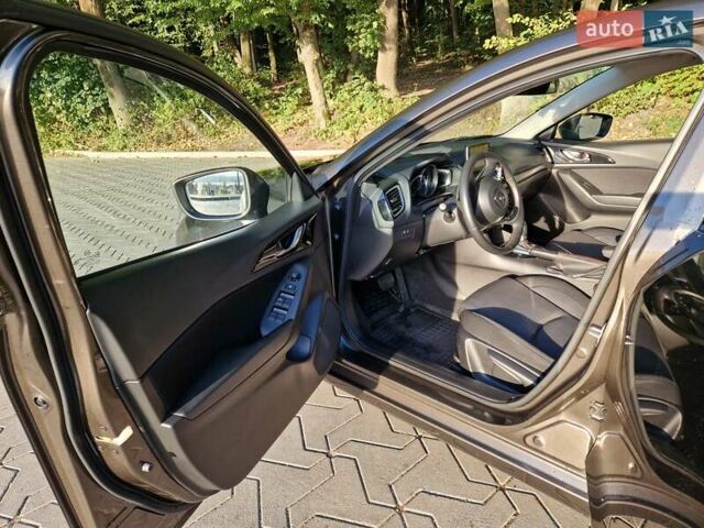 Коричневый Мазда 3, объемом двигателя 1.5 л и пробегом 77 тыс. км за 13900 $, фото 12 на Automoto.ua