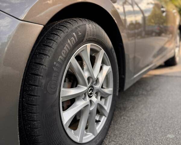 Коричневый Мазда 3, объемом двигателя 2 л и пробегом 190 тыс. км за 11200 $, фото 5 на Automoto.ua