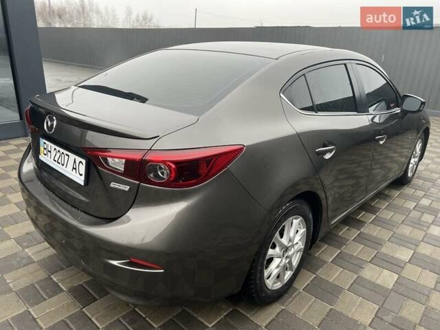 Коричневий Мазда 3, об'ємом двигуна 1.5 л та пробігом 94 тис. км за 12990 $, фото 23 на Automoto.ua