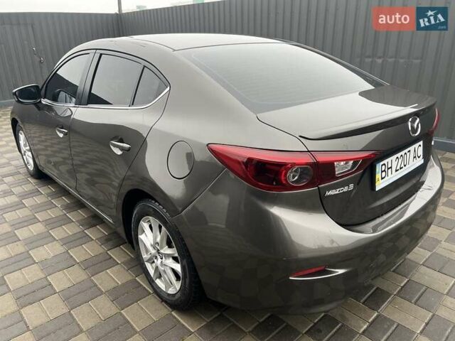 Коричневий Мазда 3, об'ємом двигуна 1.5 л та пробігом 94 тис. км за 12990 $, фото 24 на Automoto.ua