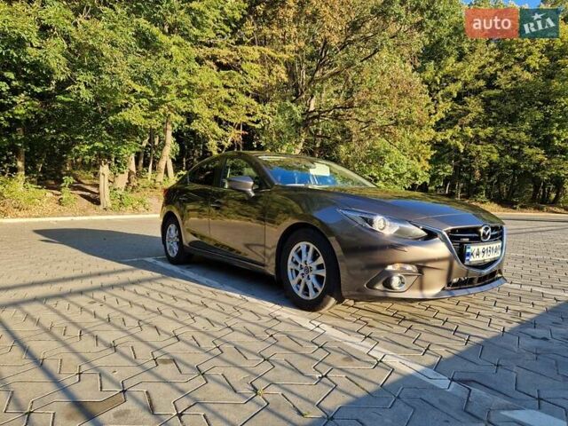 Коричневый Мазда 3, объемом двигателя 1.5 л и пробегом 77 тыс. км за 13900 $, фото 1 на Automoto.ua