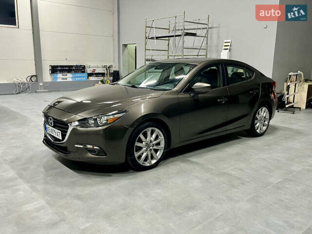 Коричневый Мазда 3, объемом двигателя 2.49 л и пробегом 106 тыс. км за 13699 $, фото 1 на Automoto.ua