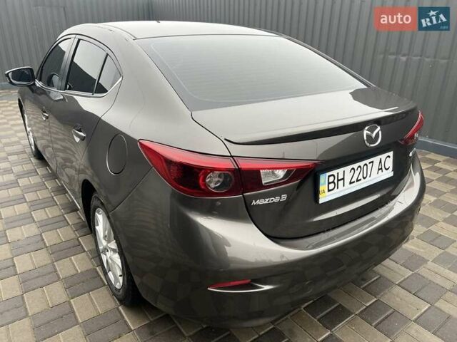 Коричневий Мазда 3, об'ємом двигуна 1.5 л та пробігом 94 тис. км за 12990 $, фото 18 на Automoto.ua
