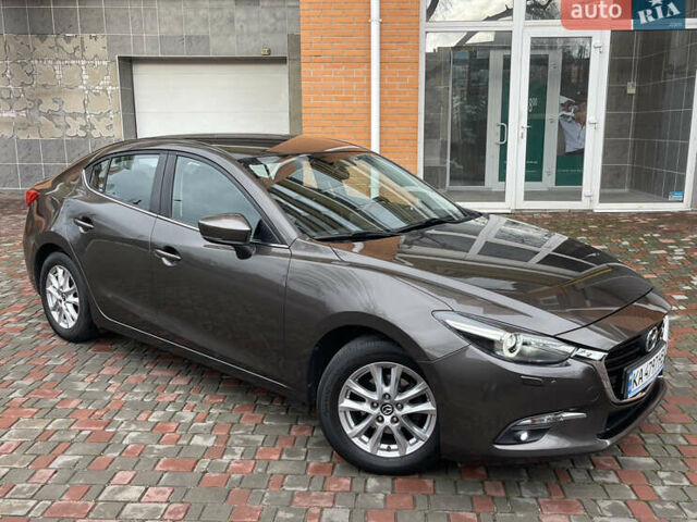 Коричневий Мазда 3, об'ємом двигуна 1.5 л та пробігом 98 тис. км за 15400 $, фото 17 на Automoto.ua