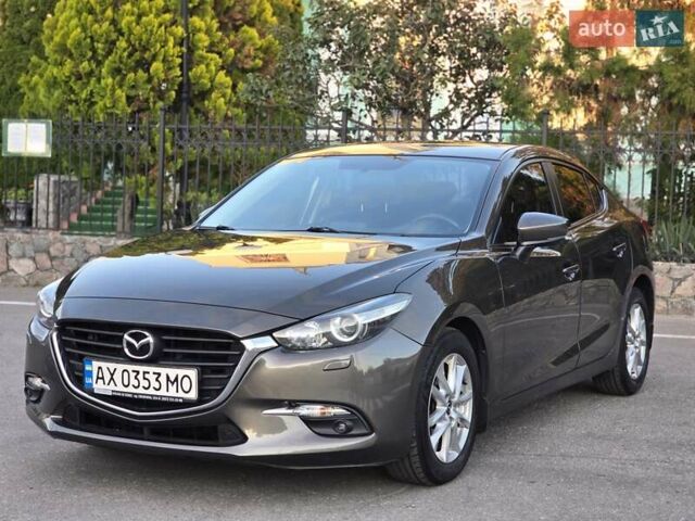Коричневый Мазда 3, объемом двигателя 1.5 л и пробегом 102 тыс. км за 14500 $, фото 2 на Automoto.ua
