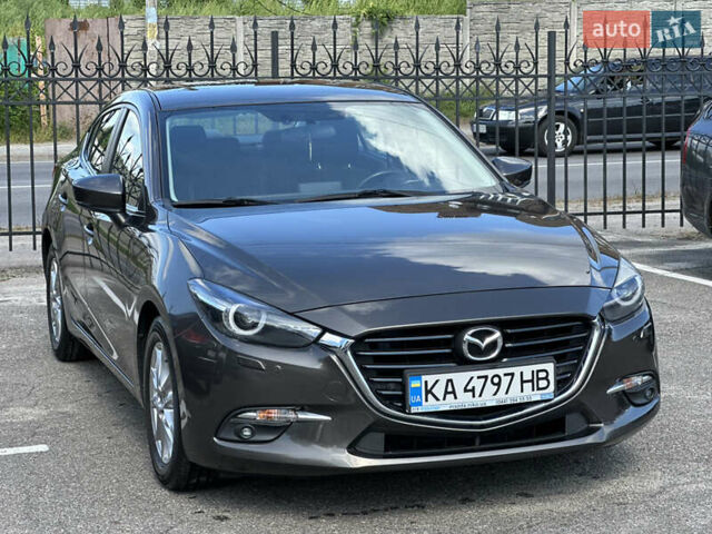 Коричневый Мазда 3, объемом двигателя 1.5 л и пробегом 98 тыс. км за 15900 $, фото 2 на Automoto.ua
