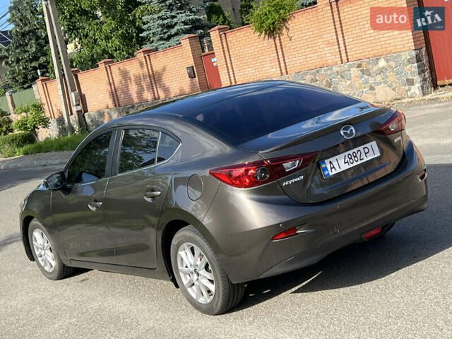 Коричневый Мазда 3, объемом двигателя 1.5 л и пробегом 223 тыс. км за 9800 $, фото 9 на Automoto.ua