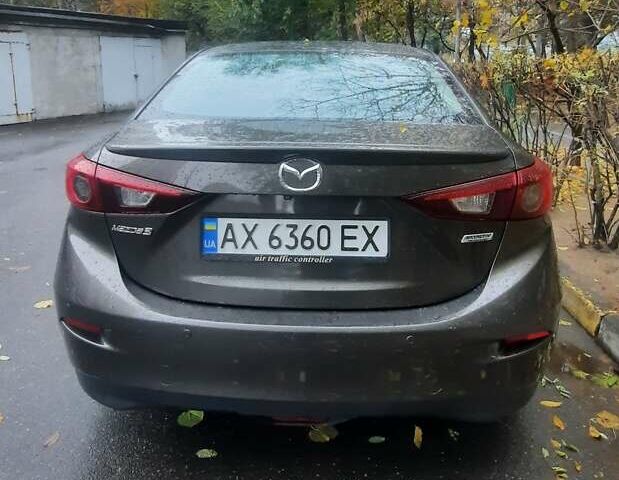 Коричневый Мазда 3, объемом двигателя 1.5 л и пробегом 165 тыс. км за 14000 $, фото 1 на Automoto.ua