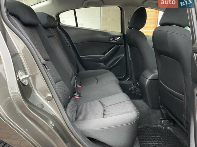 Коричневий Мазда 3, об'ємом двигуна 1.5 л та пробігом 98 тис. км за 15400 $, фото 33 на Automoto.ua