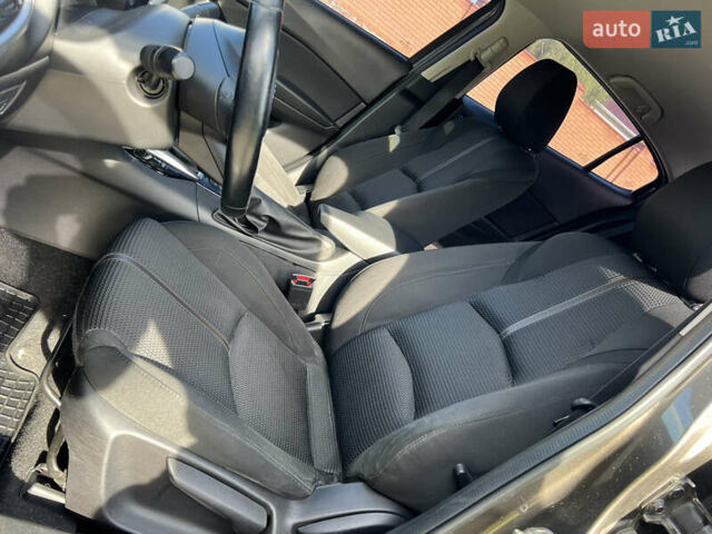 Коричневый Мазда 3, объемом двигателя 1.5 л и пробегом 223 тыс. км за 9800 $, фото 18 на Automoto.ua