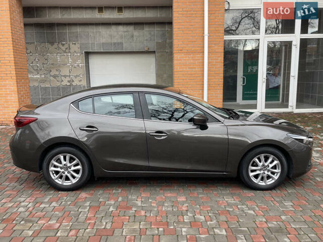 Коричневий Мазда 3, об'ємом двигуна 1.5 л та пробігом 98 тис. км за 15400 $, фото 4 на Automoto.ua