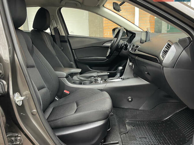 Коричневий Мазда 3, об'ємом двигуна 1.5 л та пробігом 98 тис. км за 15400 $, фото 30 на Automoto.ua