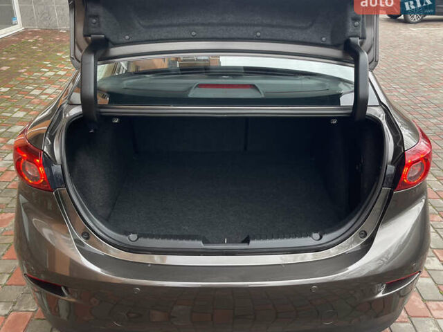 Коричневий Мазда 3, об'ємом двигуна 1.5 л та пробігом 98 тис. км за 15400 $, фото 19 на Automoto.ua