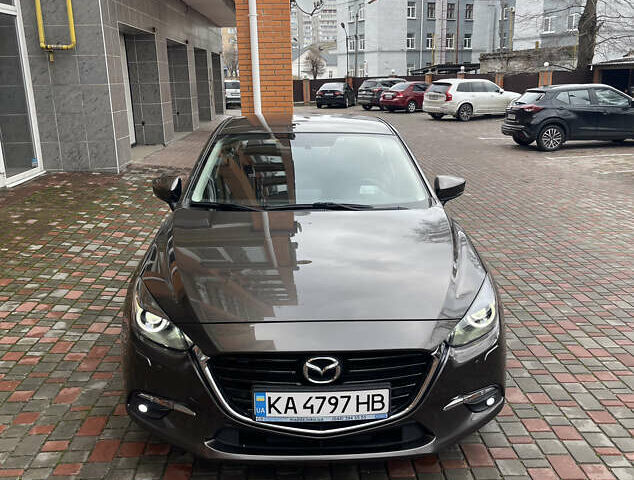 Коричневий Мазда 3, об'ємом двигуна 1.5 л та пробігом 98 тис. км за 15400 $, фото 11 на Automoto.ua