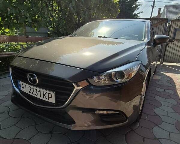 Коричневый Мазда 3, объемом двигателя 2 л и пробегом 79 тыс. км за 14500 $, фото 4 на Automoto.ua