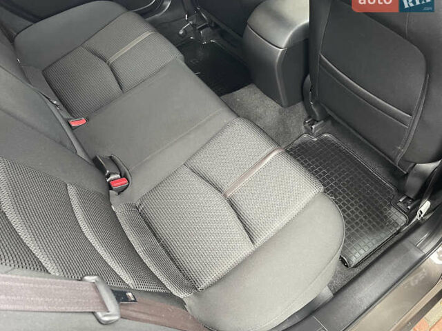 Коричневий Мазда 3, об'ємом двигуна 1.5 л та пробігом 98 тис. км за 15400 $, фото 32 на Automoto.ua