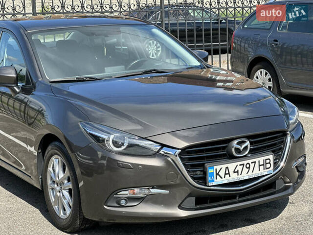 Коричневый Мазда 3, объемом двигателя 1.5 л и пробегом 98 тыс. км за 15900 $, фото 10 на Automoto.ua