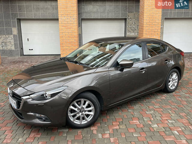 Коричневий Мазда 3, об'ємом двигуна 1.5 л та пробігом 98 тис. км за 15400 $, фото 8 на Automoto.ua