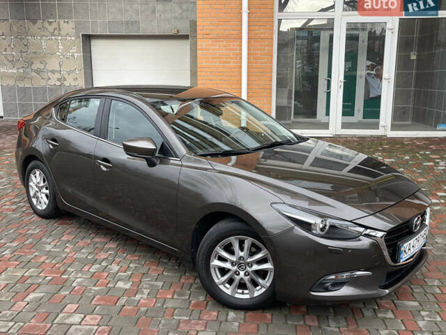 Коричневий Мазда 3, об'ємом двигуна 1.5 л та пробігом 98 тис. км за 15400 $, фото 9 на Automoto.ua