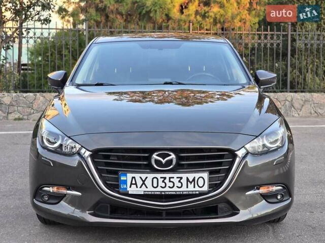 Коричневый Мазда 3, объемом двигателя 1.5 л и пробегом 102 тыс. км за 14500 $, фото 1 на Automoto.ua