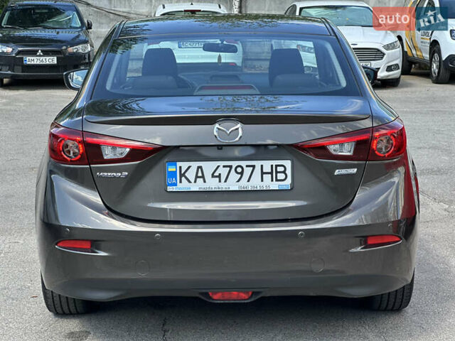 Коричневый Мазда 3, объемом двигателя 1.5 л и пробегом 98 тыс. км за 15900 $, фото 12 на Automoto.ua