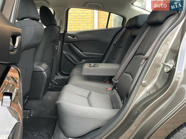 Коричневий Мазда 3, об'ємом двигуна 1.5 л та пробігом 98 тис. км за 15400 $, фото 27 на Automoto.ua