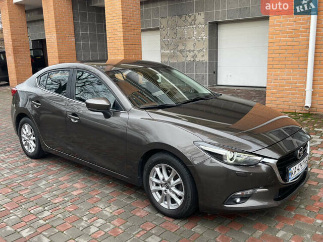 Коричневий Мазда 3, об'ємом двигуна 1.5 л та пробігом 98 тис. км за 15400 $, фото 12 на Automoto.ua