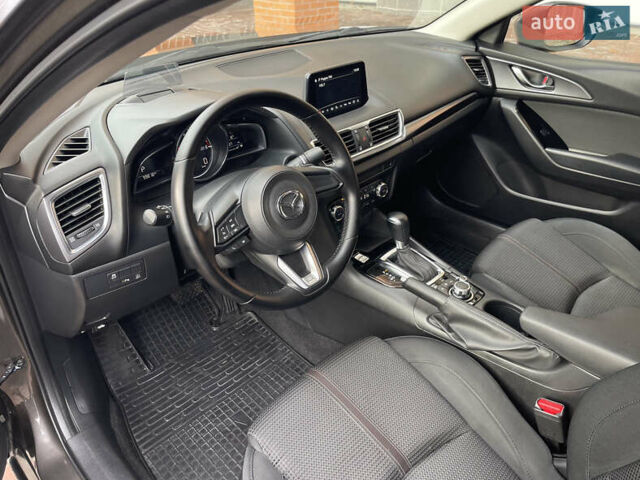 Коричневий Мазда 3, об'ємом двигуна 1.5 л та пробігом 98 тис. км за 15400 $, фото 21 на Automoto.ua