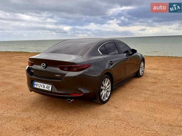 Коричневий Мазда 3, об'ємом двигуна 2.5 л та пробігом 75 тис. км за 15800 $, фото 1 на Automoto.ua