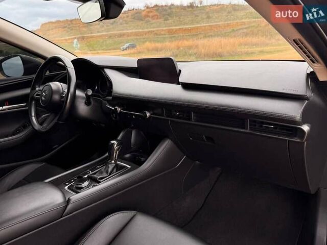 Коричневий Мазда 3, об'ємом двигуна 2.5 л та пробігом 75 тис. км за 15800 $, фото 17 на Automoto.ua