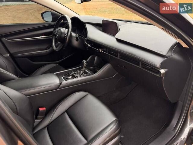 Коричневий Мазда 3, об'ємом двигуна 2.5 л та пробігом 75 тис. км за 15800 $, фото 16 на Automoto.ua