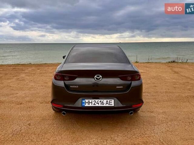 Коричневий Мазда 3, об'ємом двигуна 2.5 л та пробігом 75 тис. км за 15800 $, фото 3 на Automoto.ua