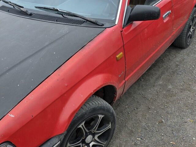 Красный Мазда 3, объемом двигателя 1.6 л и пробегом 380 тыс. км за 800 $, фото 1 на Automoto.ua