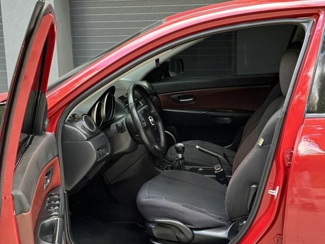 Красный Мазда 3, объемом двигателя 2 л и пробегом 210 тыс. км за 3500 $, фото 11 на Automoto.ua