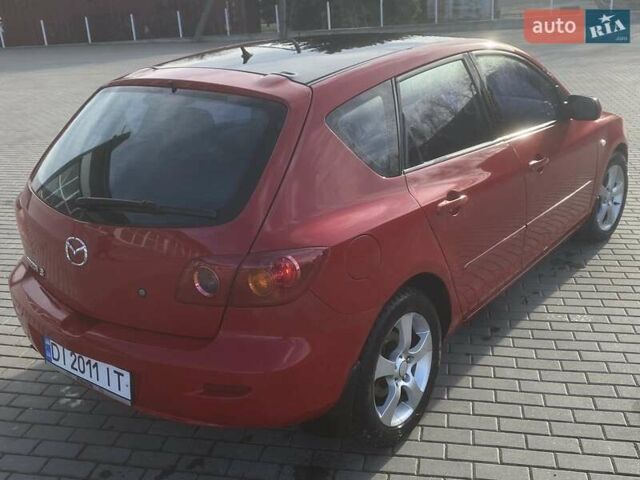Червоний Мазда 3, об'ємом двигуна 1.6 л та пробігом 165 тис. км за 4850 $, фото 9 на Automoto.ua
