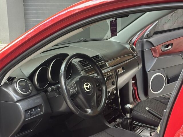 Красный Мазда 3, объемом двигателя 2 л и пробегом 210 тыс. км за 3500 $, фото 18 на Automoto.ua