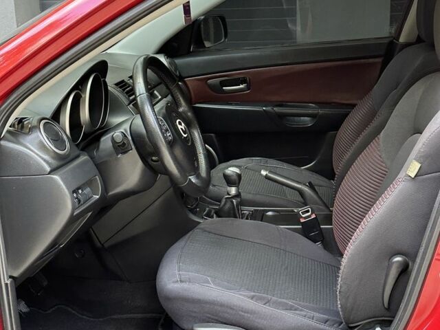 Красный Мазда 3, объемом двигателя 2 л и пробегом 210 тыс. км за 3500 $, фото 10 на Automoto.ua