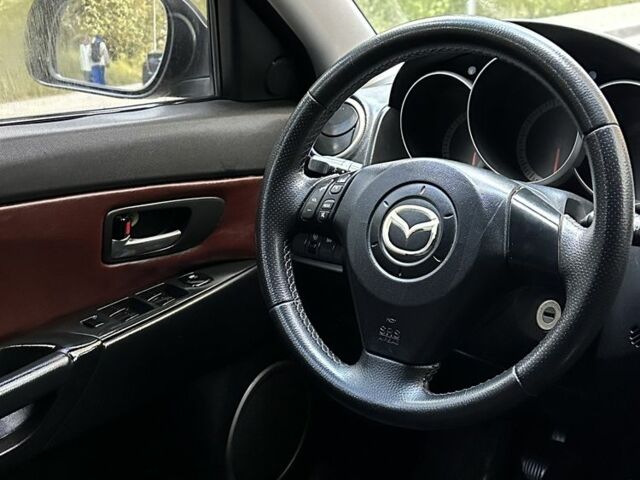 Красный Мазда 3, объемом двигателя 2 л и пробегом 210 тыс. км за 3500 $, фото 20 на Automoto.ua