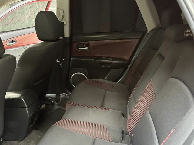 Красный Мазда 3, объемом двигателя 2 л и пробегом 210 тыс. км за 3500 $, фото 17 на Automoto.ua