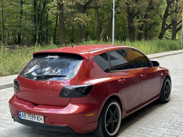 Красный Мазда 3, объемом двигателя 2 л и пробегом 210 тыс. км за 3500 $, фото 2 на Automoto.ua