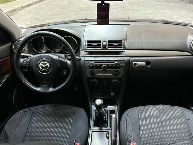 Красный Мазда 3, объемом двигателя 2 л и пробегом 210 тыс. км за 3500 $, фото 13 на Automoto.ua